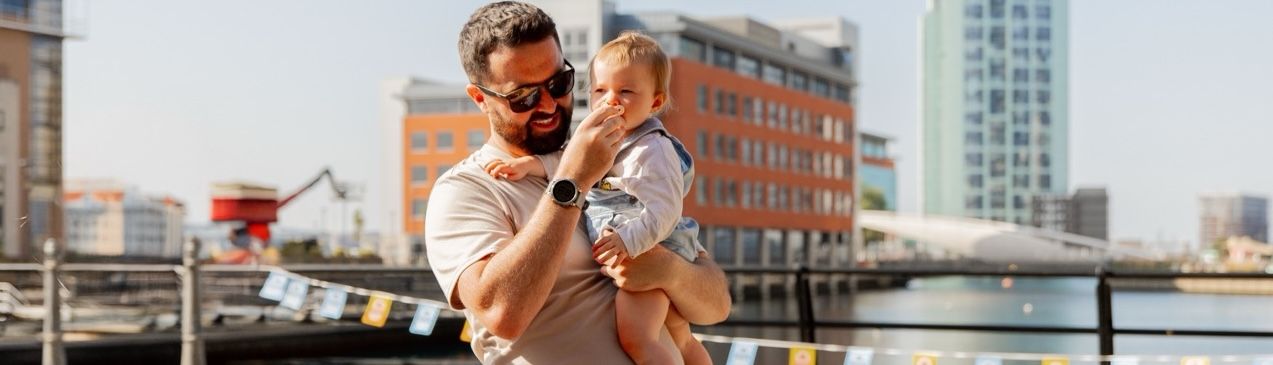 Father with baby on the Liverpool Waters Docks