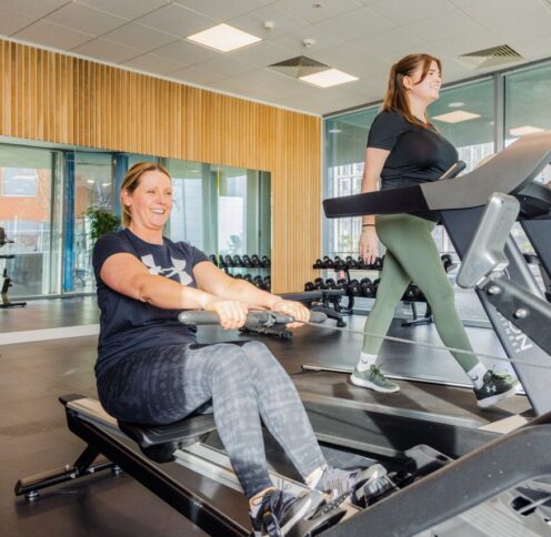 Two people working out in the Princes dock gym.