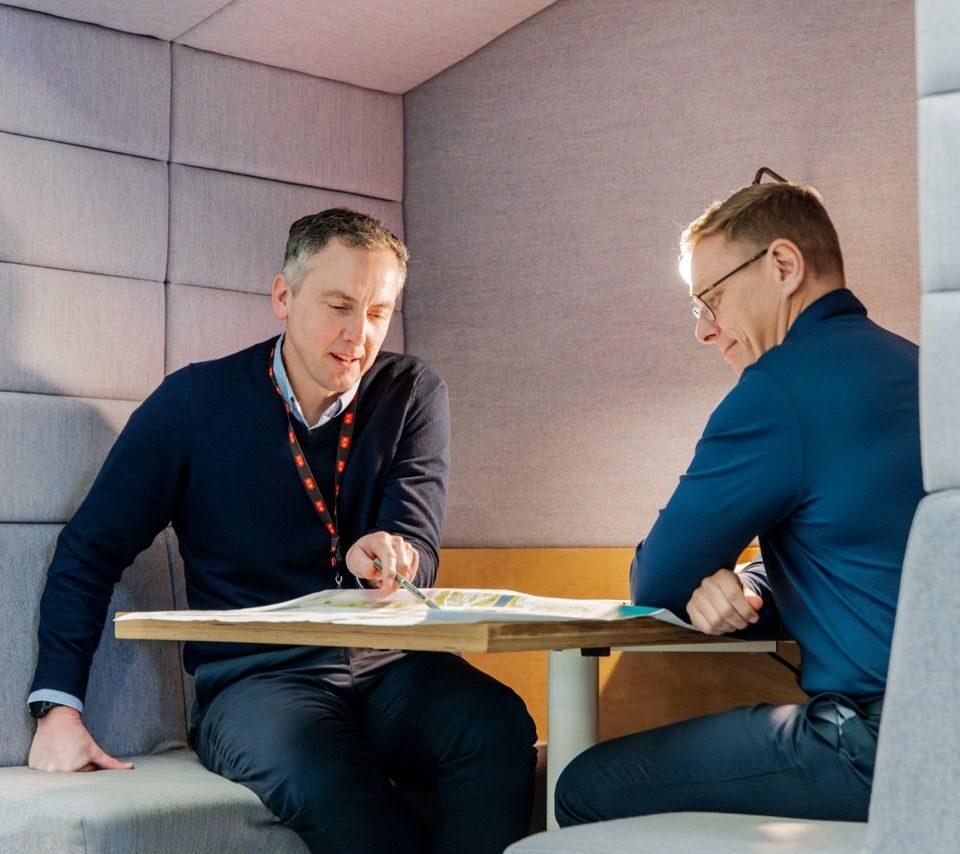 Two person meeting in booth at Princes Dock flexible workspace.