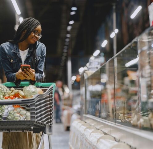 Woman shopping in food store