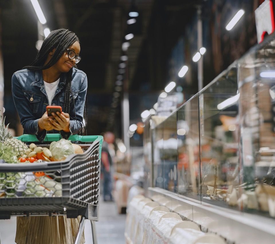 Woman shopping in food store